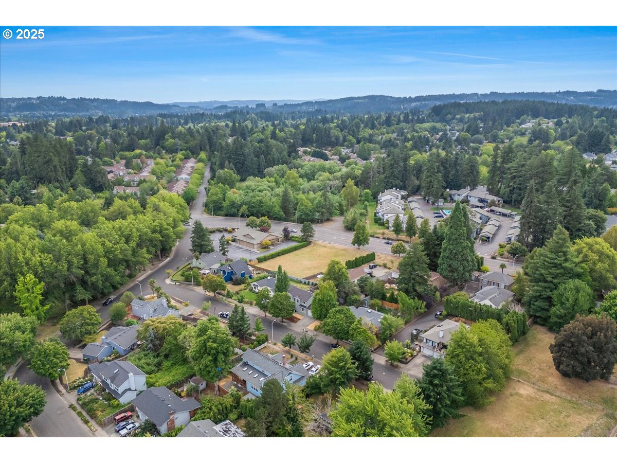 7505 Southwest Alpine Drive Beaverton, OR 97008 - Photo 46 of 48 a view of a city with lush green forest