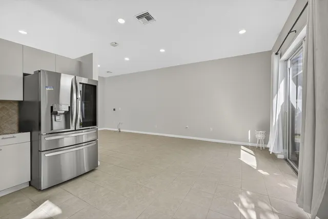 a bathroom with a sink toilet vanity and shower