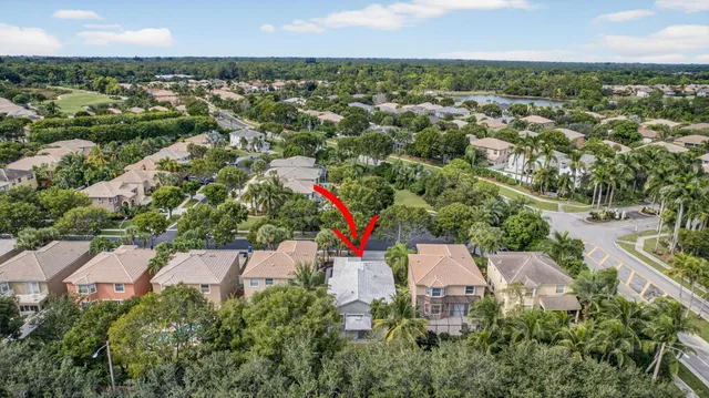an aerial view of a house with a garden
