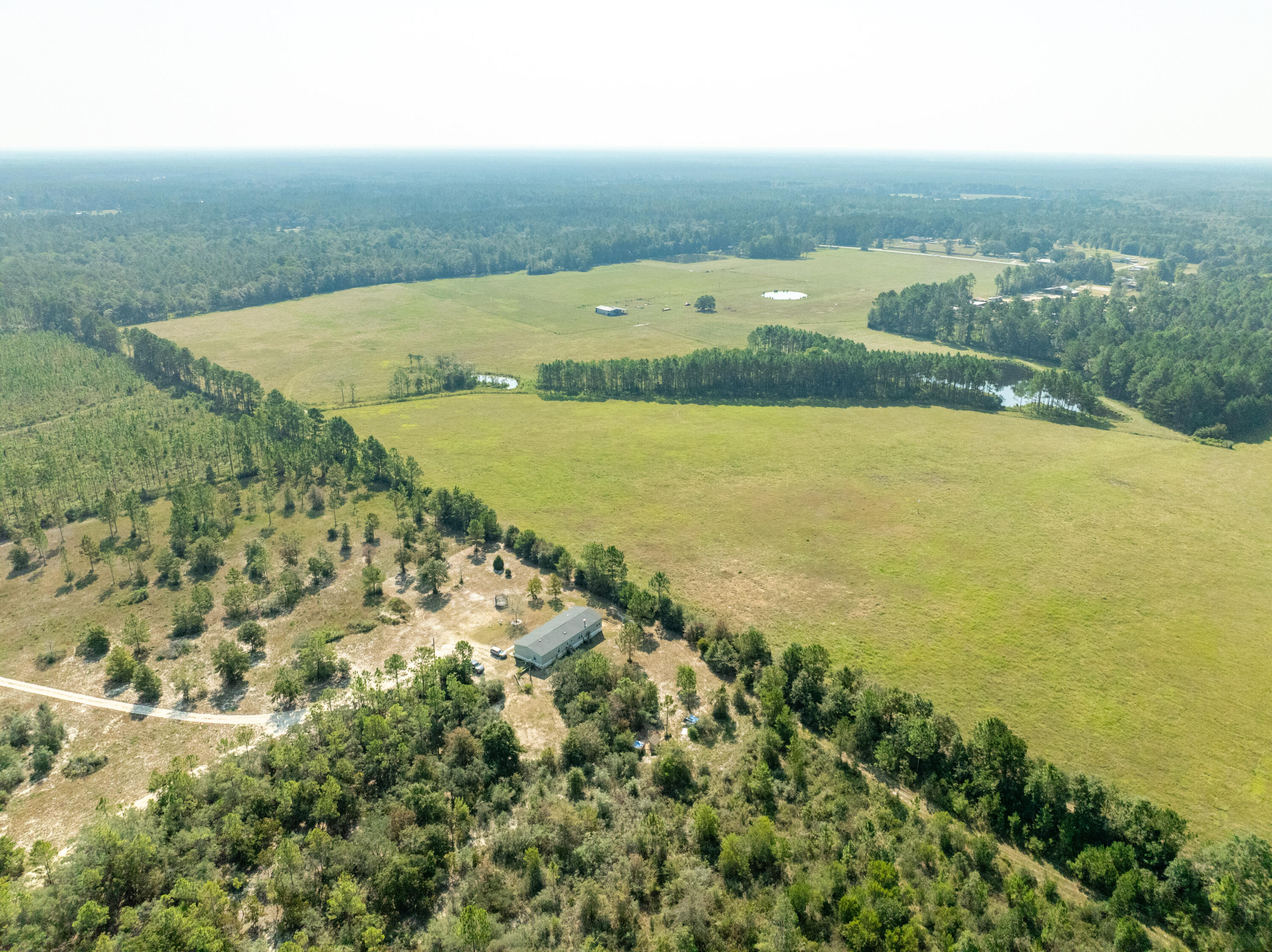 3717 Highway 20 Freeport, FL 32439 - Photo 11 of 21 an aerial view of residential houses with outdoor space