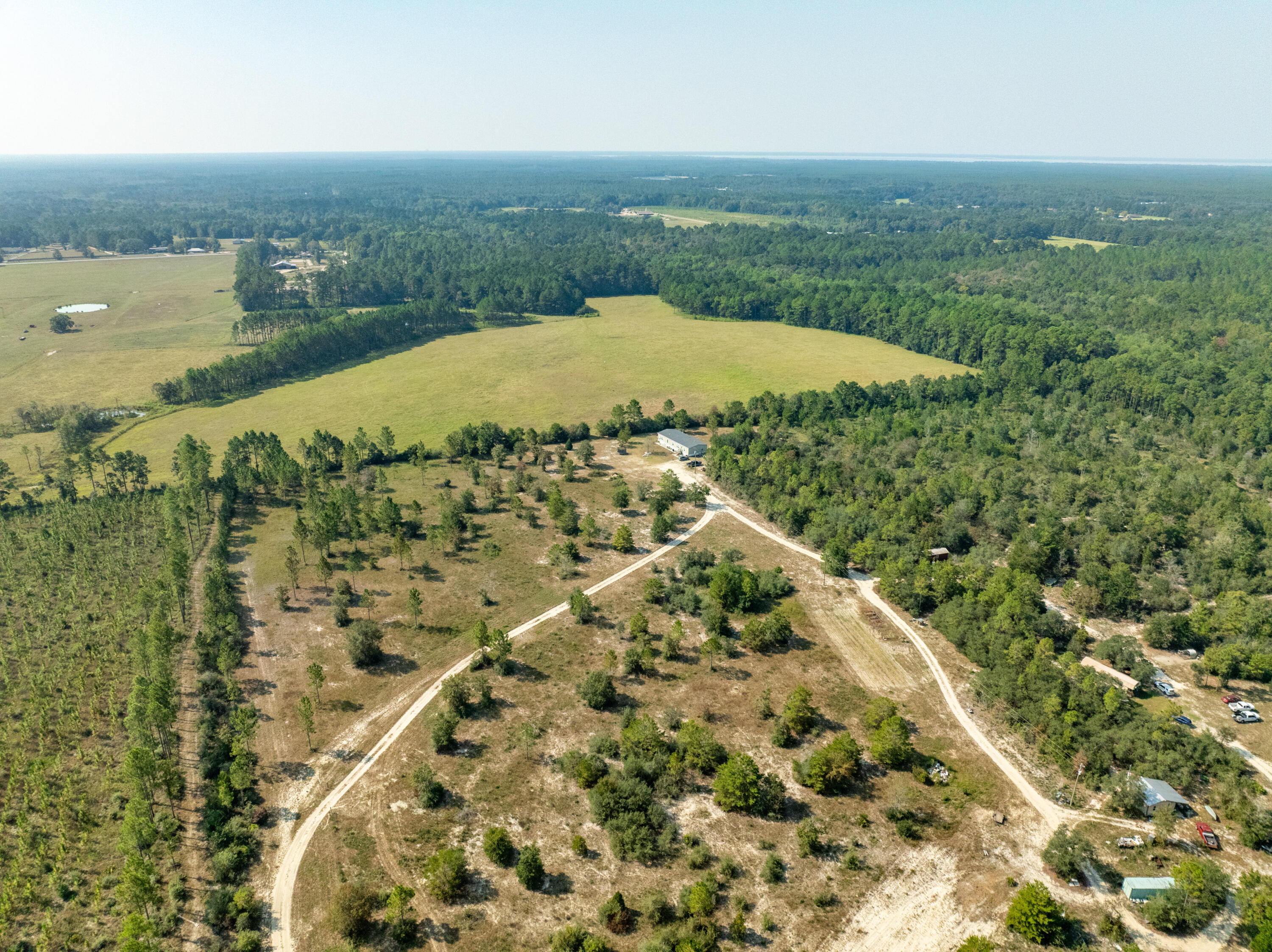 3717 Highway 20 Freeport, FL 32439 - Photo 14 of 21 an aerial view of a house with a lake view