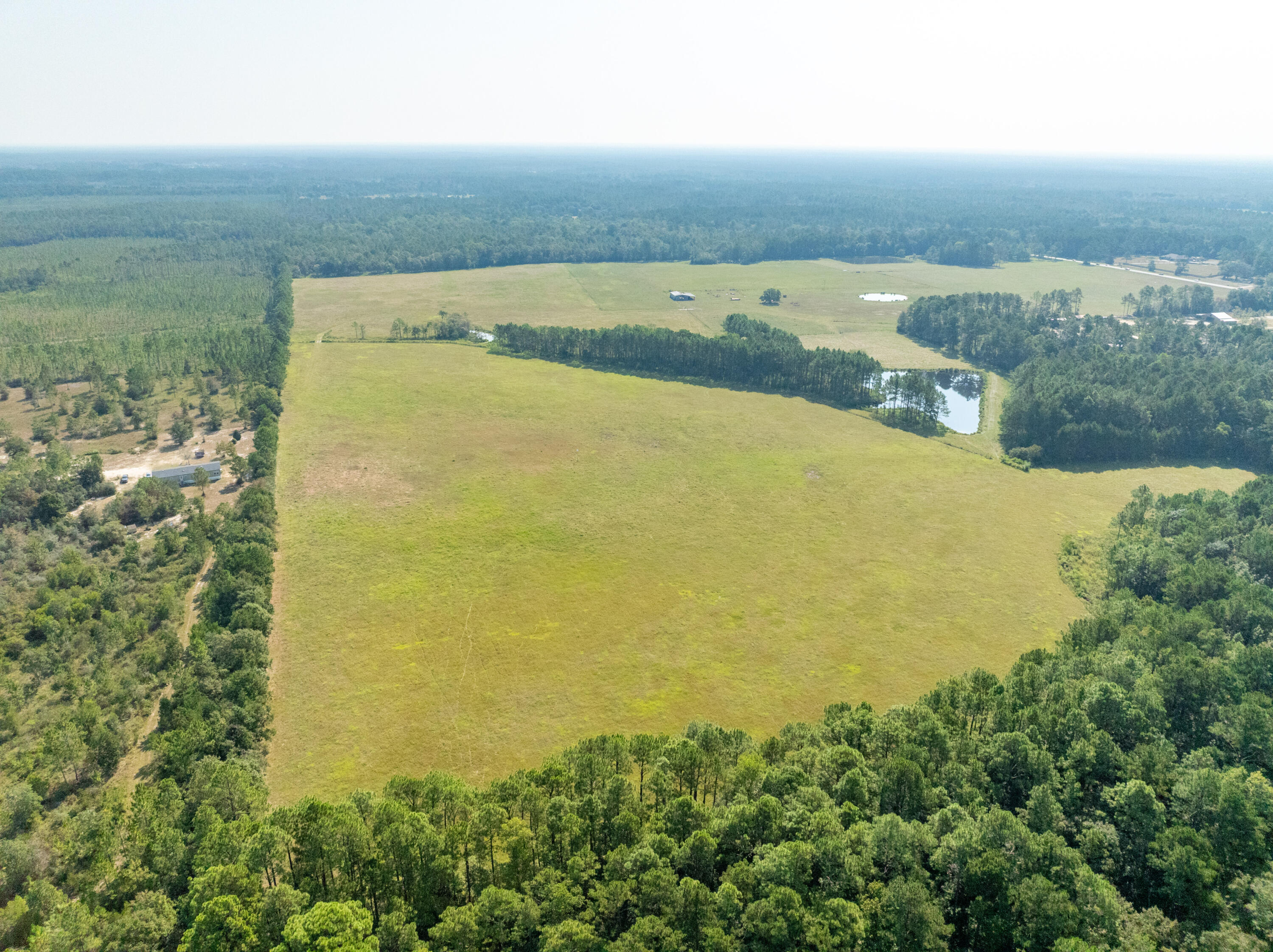 3717 Highway 20 Freeport, FL 32439 - Photo 9 of 21 an aerial view of beach and residential houses with outdoor space