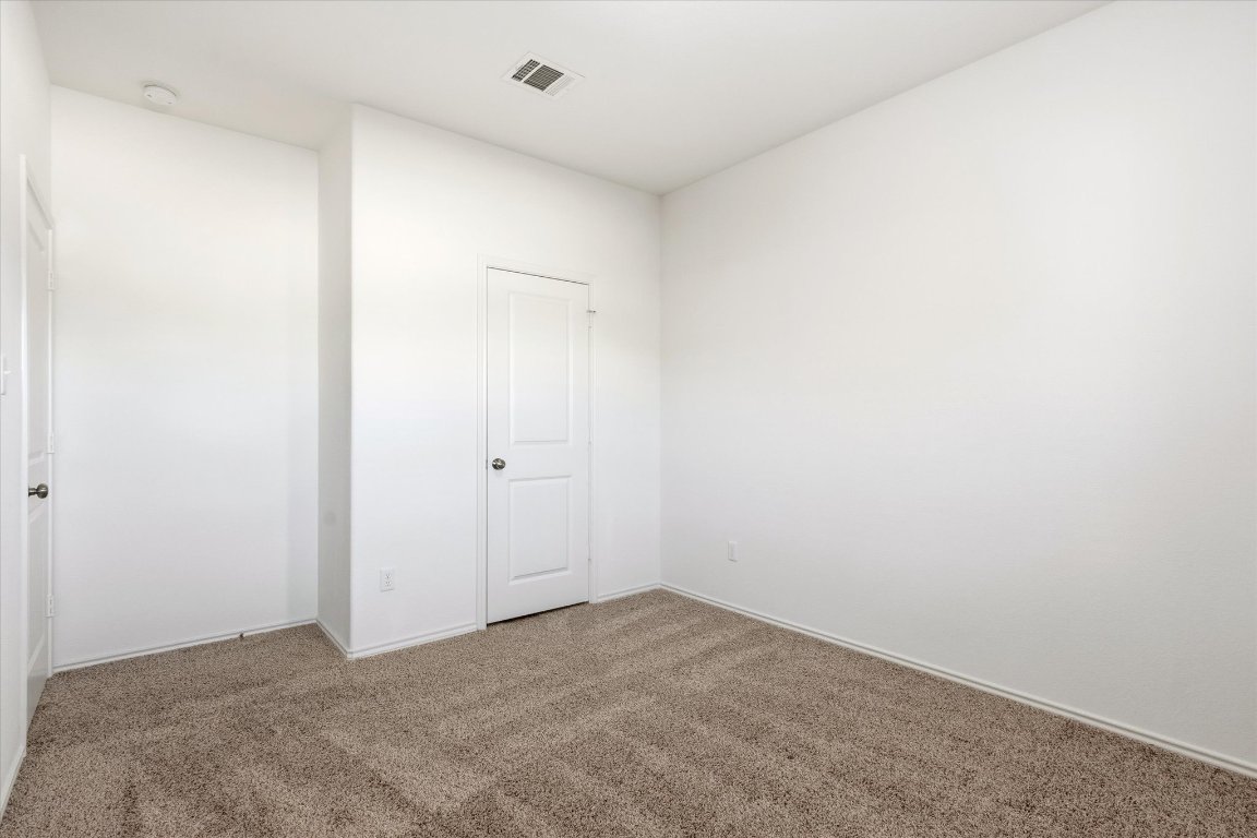 14105 Nightview Cove Pflugerville, TX 78660 - Photo 25 of 36 a view of an empty room