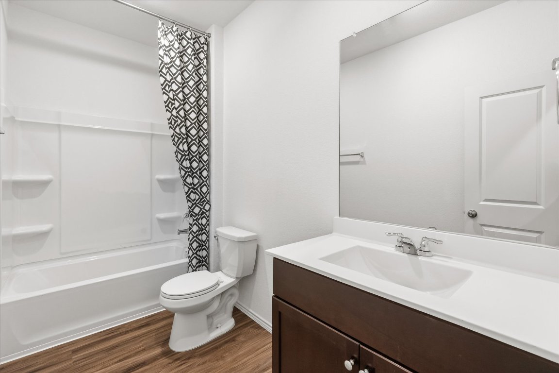 14105 Nightview Cove Pflugerville, TX 78660 - Photo 28 of 36 a bathroom with a sink toilet and shower