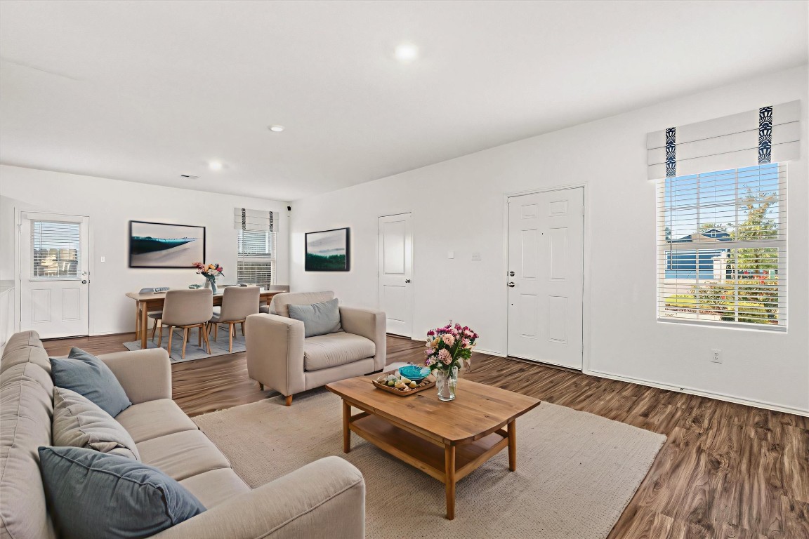 14105 Nightview Cove Pflugerville, TX 78660 - Photo 8 of 36 a living room with furniture and wooden floor