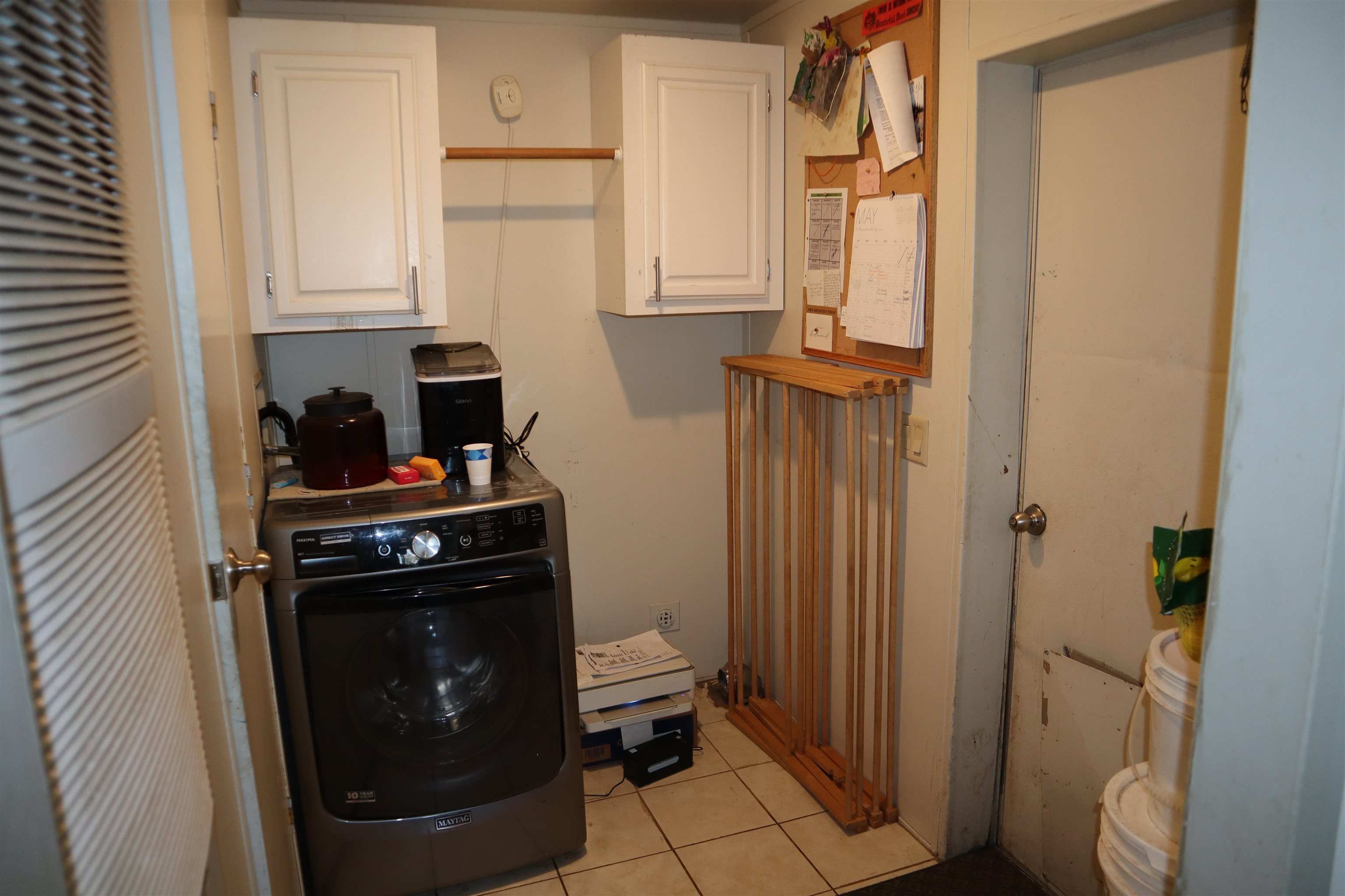 193 Fairground Road Quincy, CA 95971 - Photo 8 of 20 a view of a storage and utility room with washer and dryer