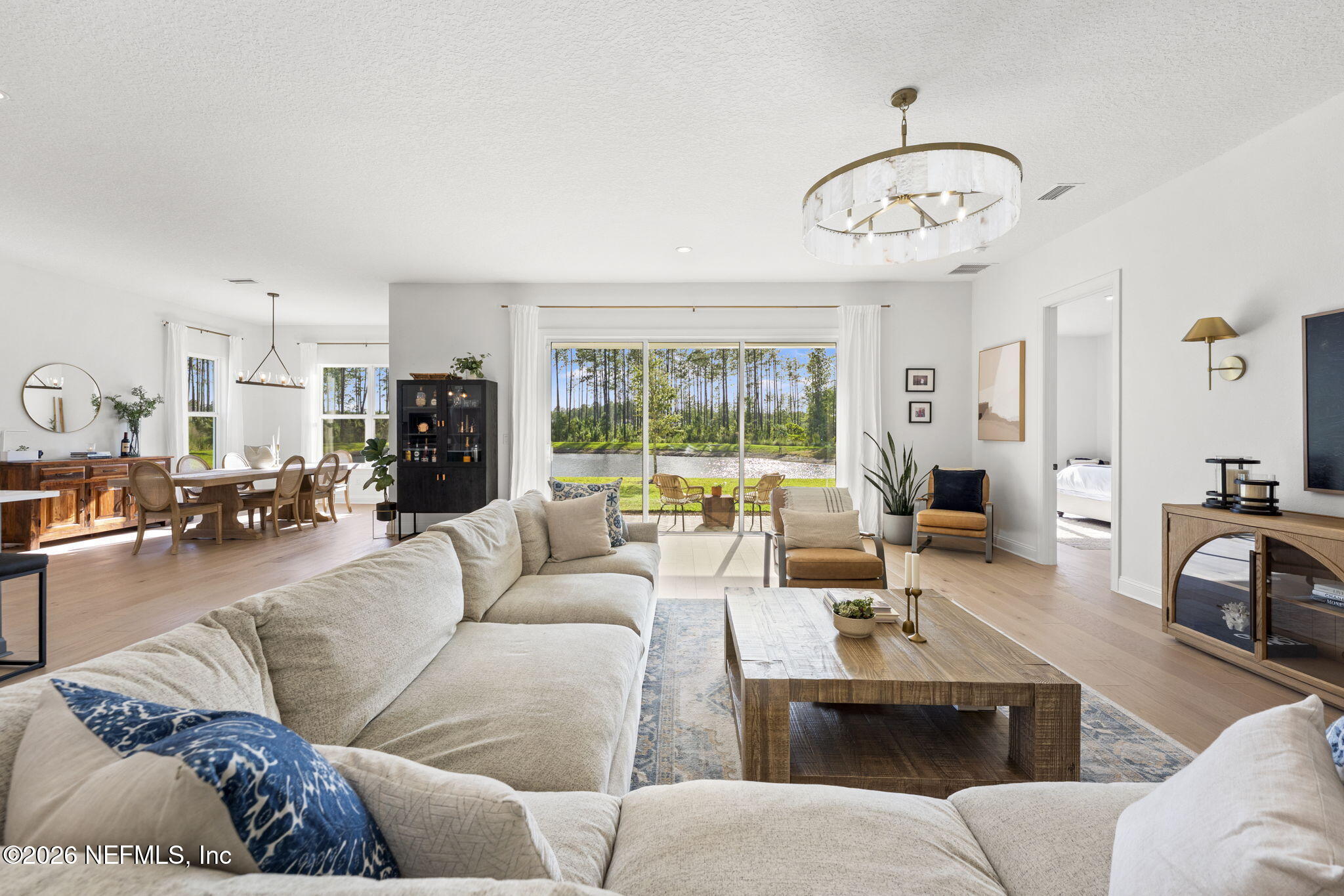 101 Elm Br Road St. Johns, FL 32259 - Photo 25 of 77 a living room with furniture kitchen view and large windows