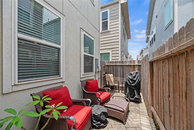 a view of a chairs in patio