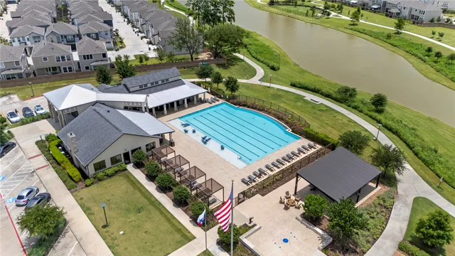 an aerial view of a house with a garden