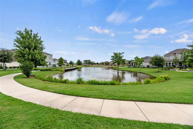a view of a garden and basketball court