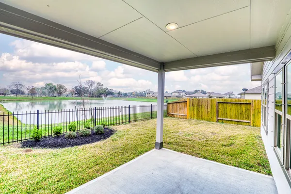 a view of a house with a back yard