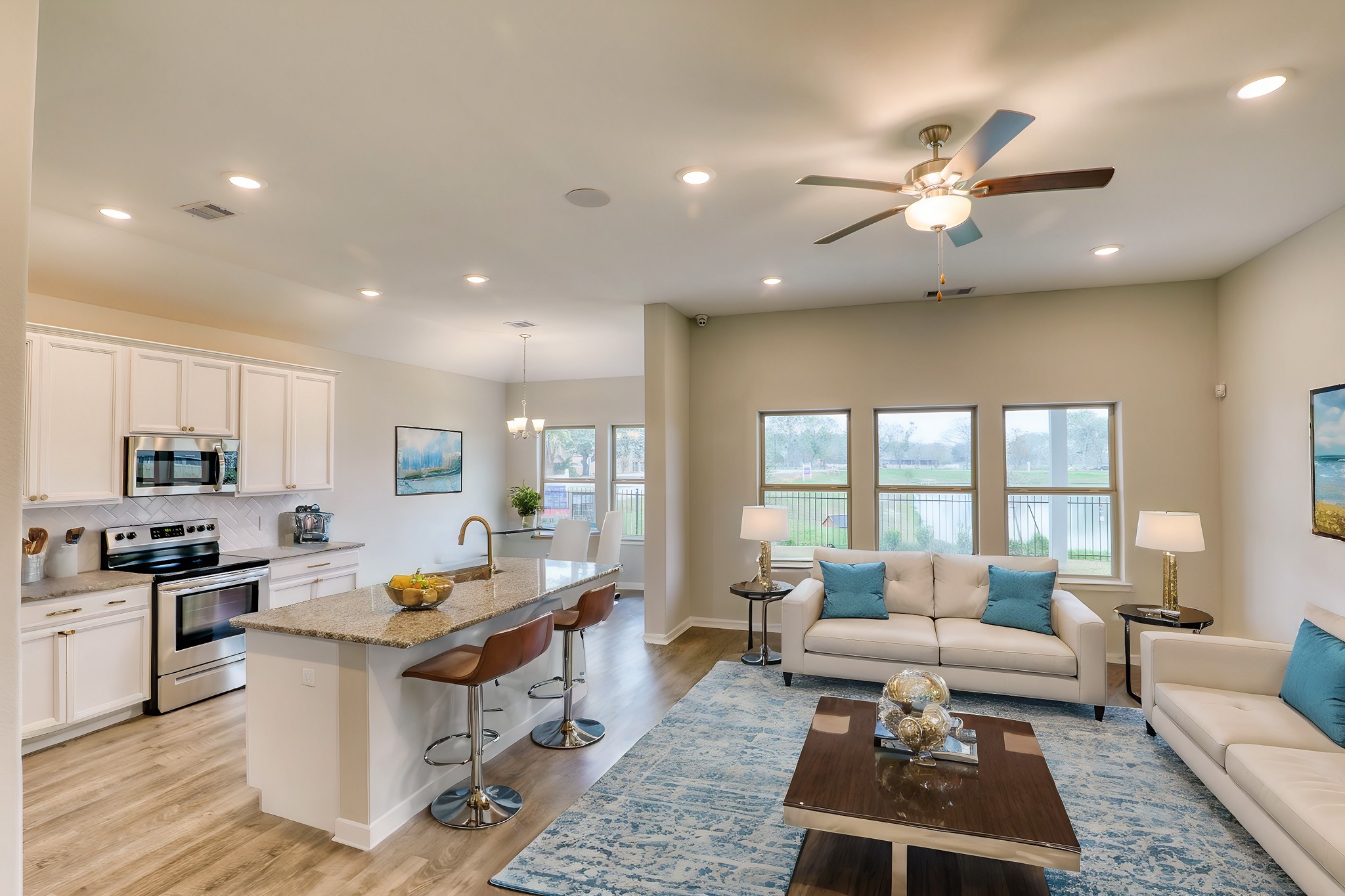 201 Bryan Way Angleton, TX 77515 - Photo 5 of 38 a living room with stainless steel appliances furniture and a kitchen view