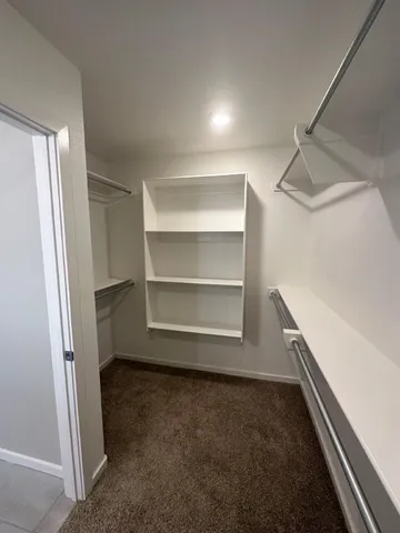 a storage room with washer and dryer