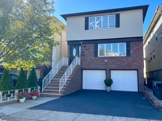 front view of a house with a staircase