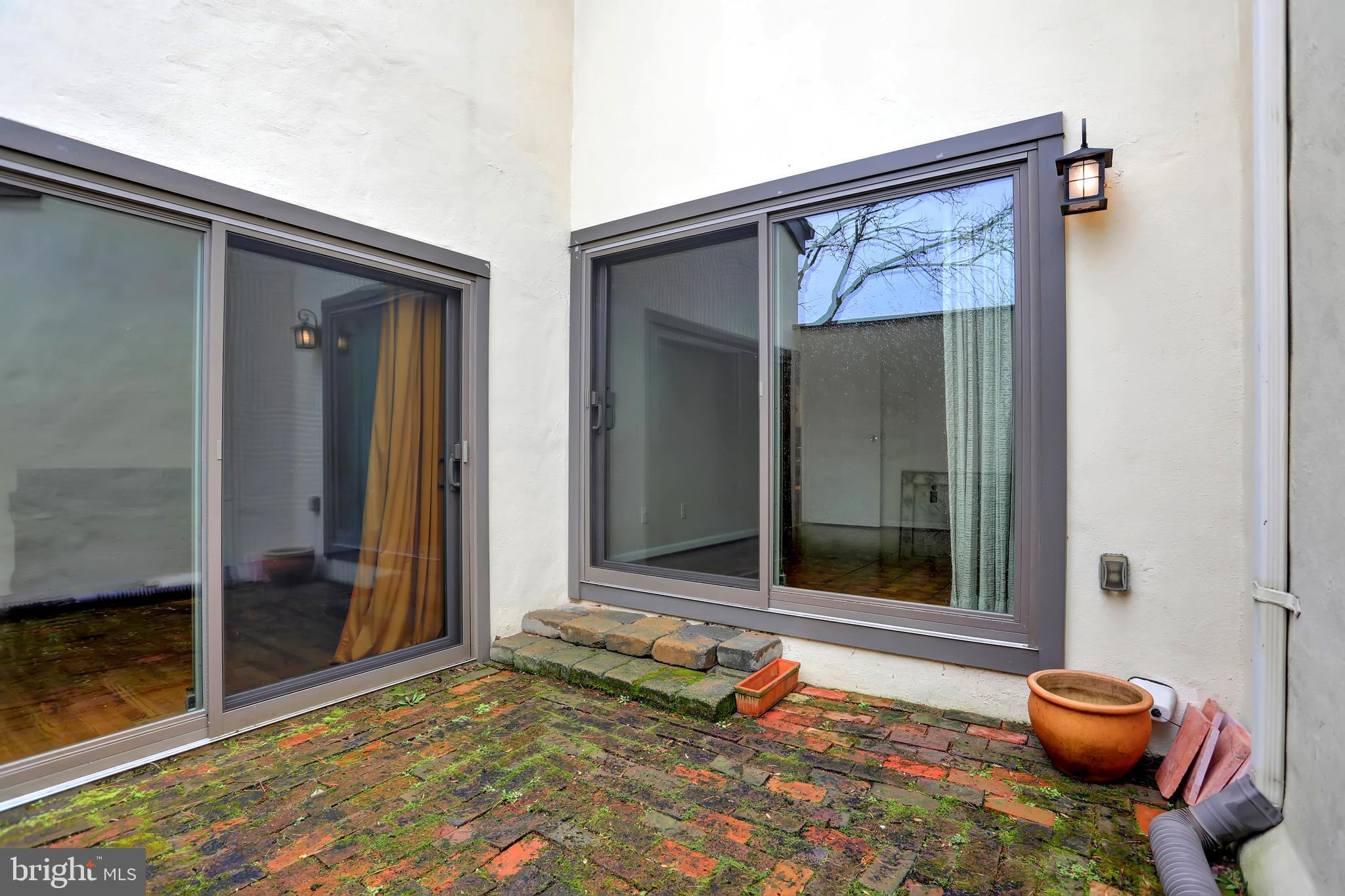 735 Stoney Spring Drive Baltimore, MD 21210 - Photo 11 of 54 Courtyard off of Den and LivingRoom