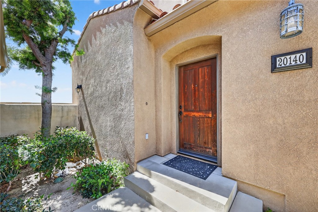 20140 Pienza Lane Porter Ranch, CA 91326 - Photo 1 of 1 a view of front door of house
