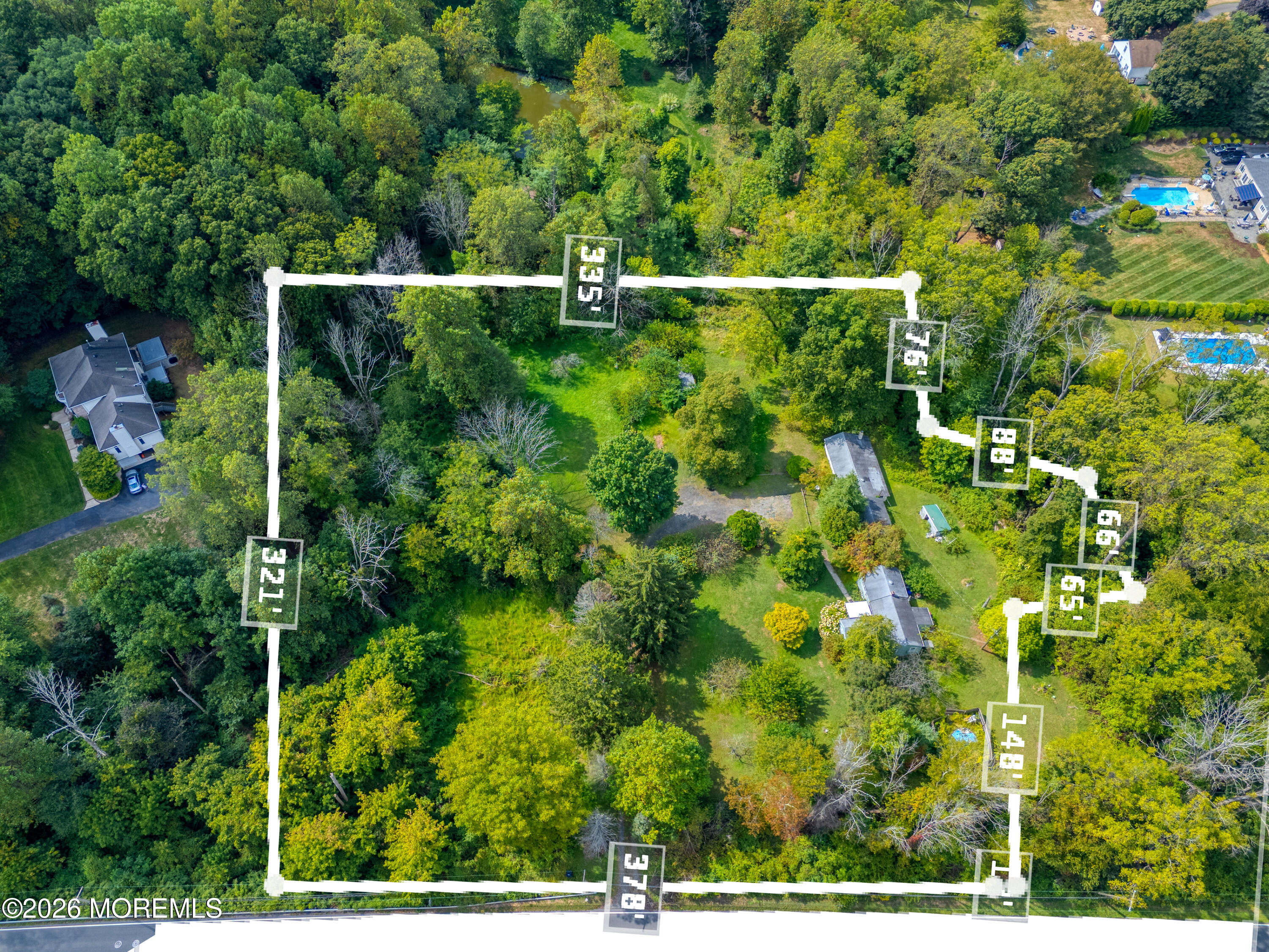 1158 Highway 34 Colts Neck, NJ 07722 - Photo 1 of 14 a view of a lush green forest