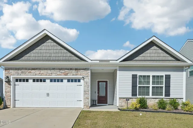 a view of livingroom with furniture and wooden floor