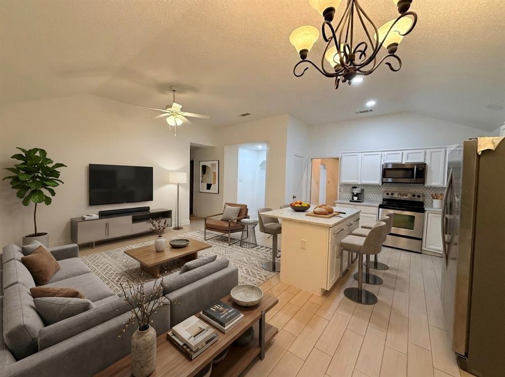 1505 Clover Drive Allen, TX 75002 - Photo 8 of 26 Staged family room and kitchen