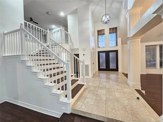 a view of entryway with wooden floor