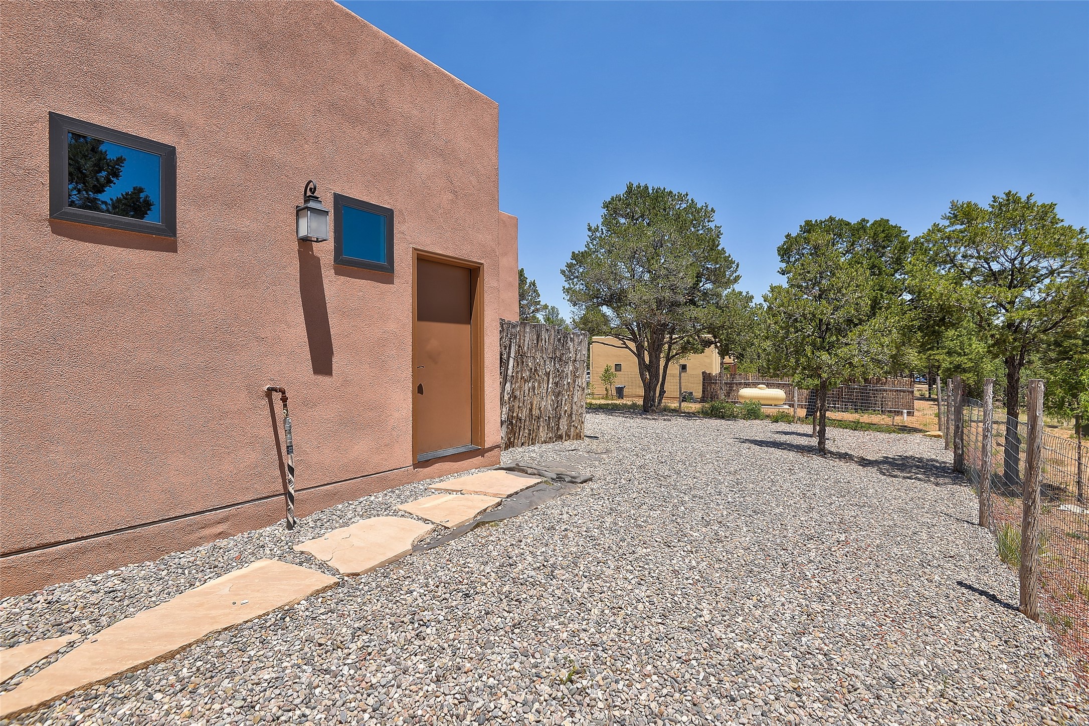 6 Dancing Hawk Drive Pecos, NM 87552 - Photo 27 of 29 Outside entrance to double car garage