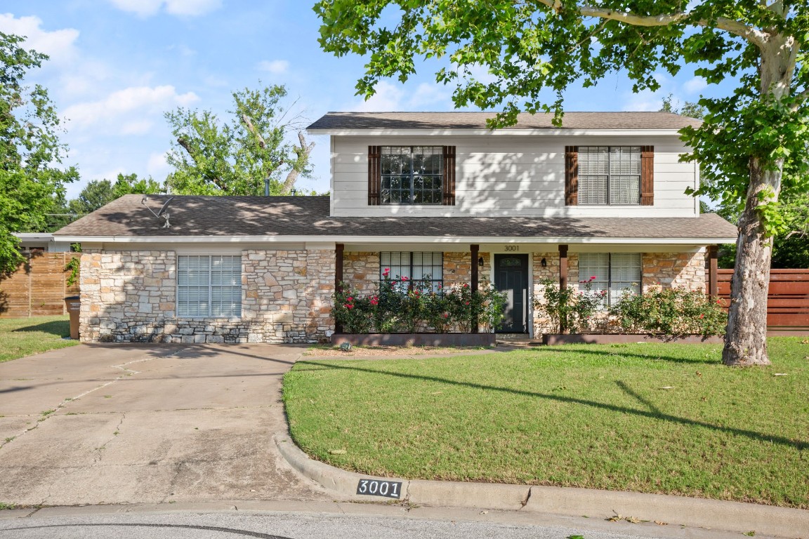 front view of house with a yard