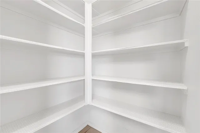 a view of an empty walk in closet
