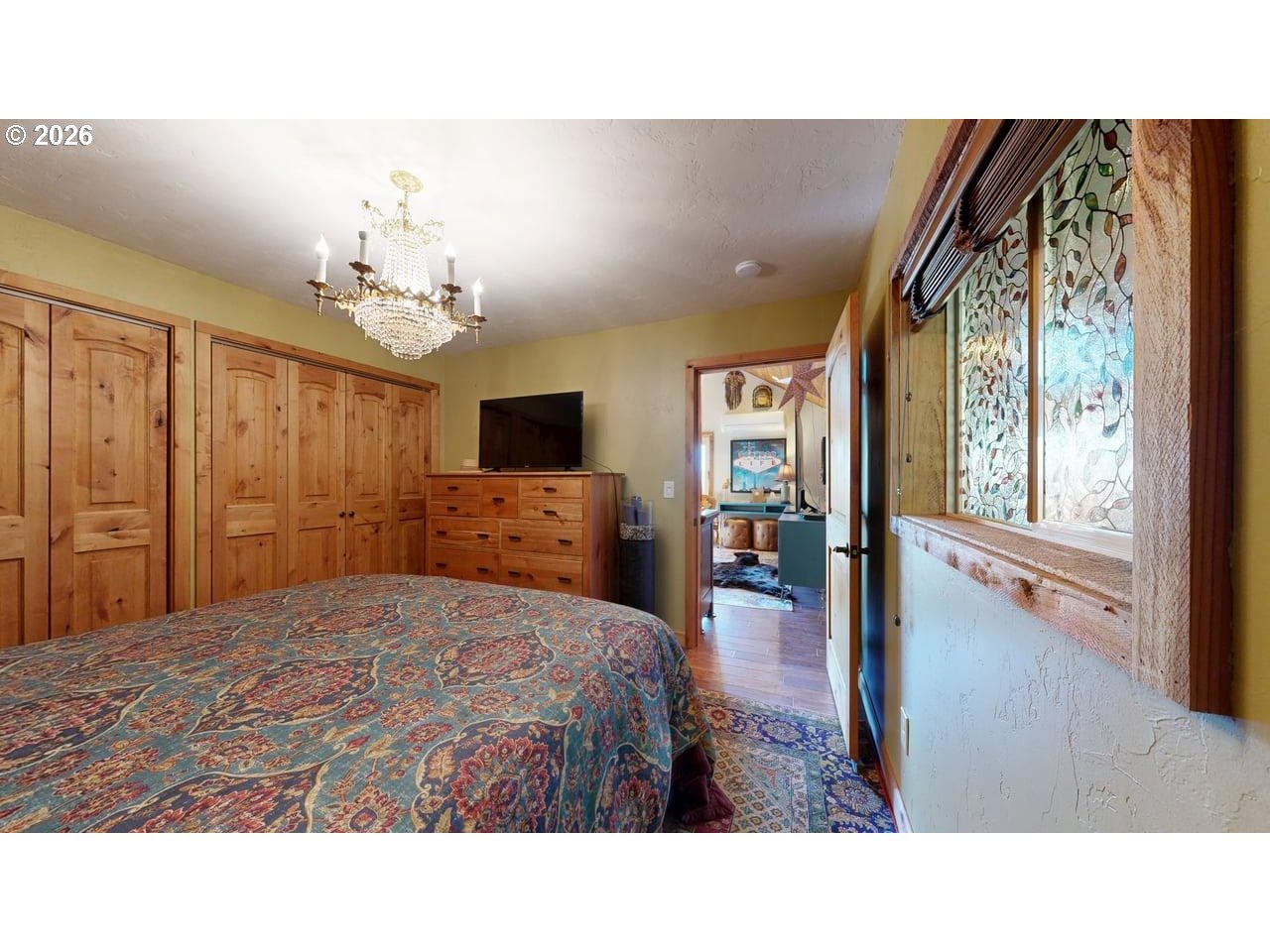 99106 East Freeman Lane Brookings, OR 97415 - Photo 19 of 37 a living room with furniture and a flat screen tv