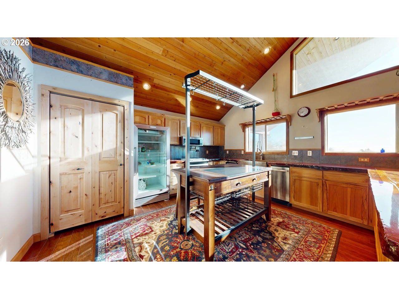 99106 East Freeman Lane Brookings, OR 97415 - Photo 10 of 37 a kitchen with a table and chairs
