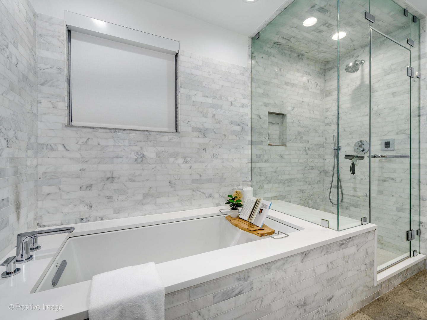 1821 West Cortland Street Chicago, IL 60622 - Photo 31 of 50 a bathroom with a bathtub and a shower