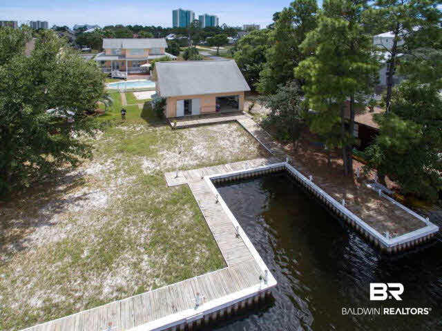 26595 Marina Road Orange Beach, AL 36561 - Photo 5 of 29 Canal is deep enough to maintain a large boat.
