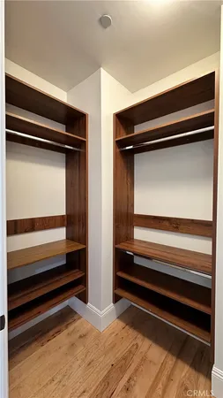 a view of room with wooden floor and air conditioner