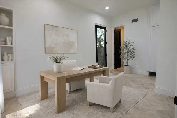 a view of a livingroom with furniture and window