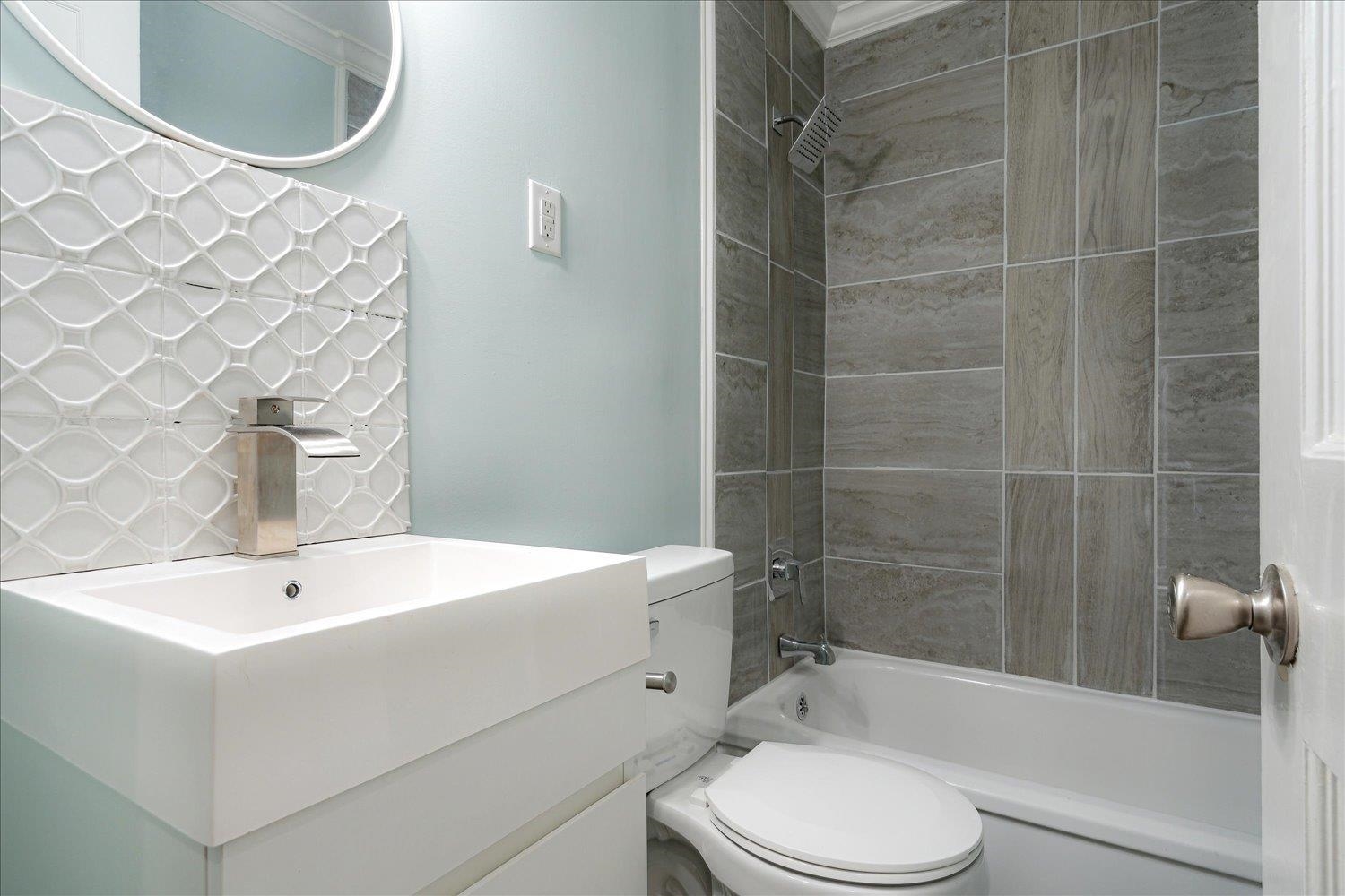 774 Eastern Drive Memphis, TN 38122 - Photo 24 of 33 a bathroom with a sink a toilet and shower