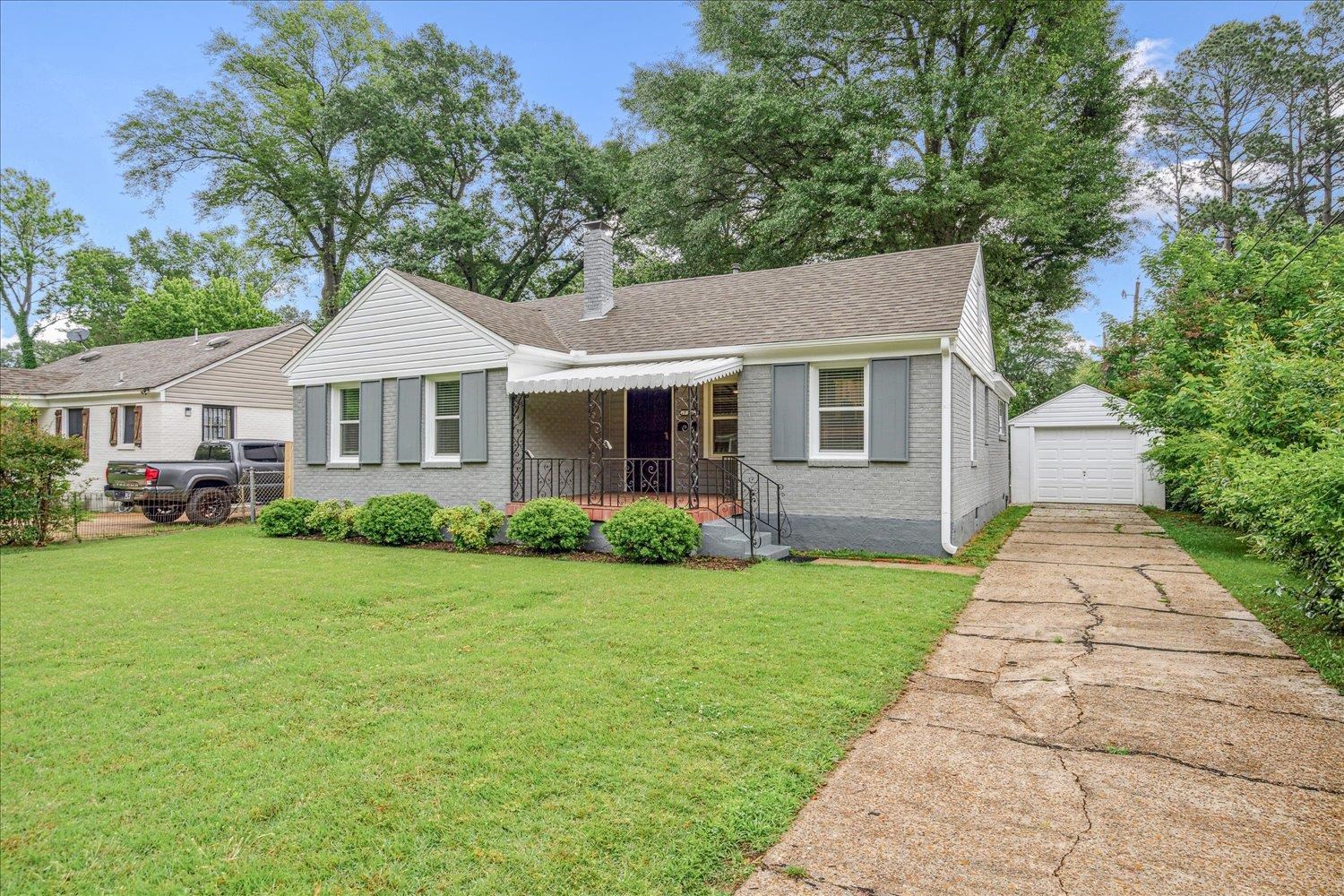 774 Eastern Drive Memphis, TN 38122 - Photo 3 of 33 a front view of a house with a yard