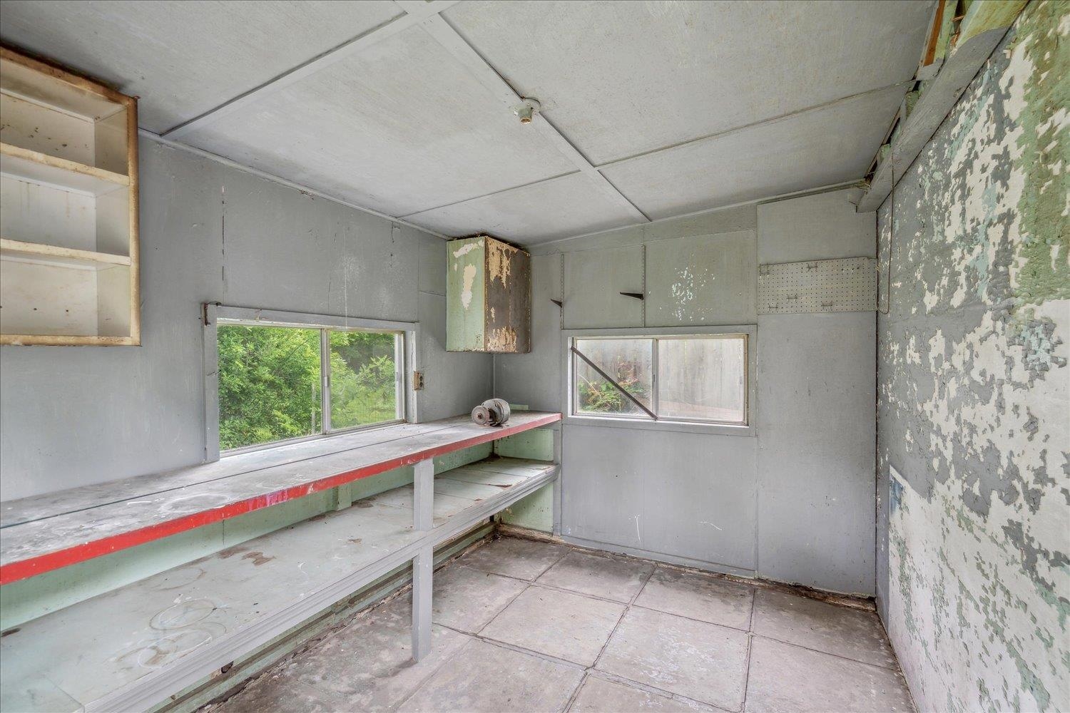 774 Eastern Drive Memphis, TN 38122 - Photo 32 of 33 a kitchen with a sink and a wooden floor
