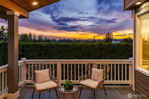 a view of a chairs and table in the patio