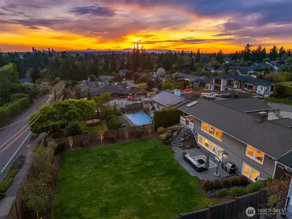 an aerial view of a house with a garden
