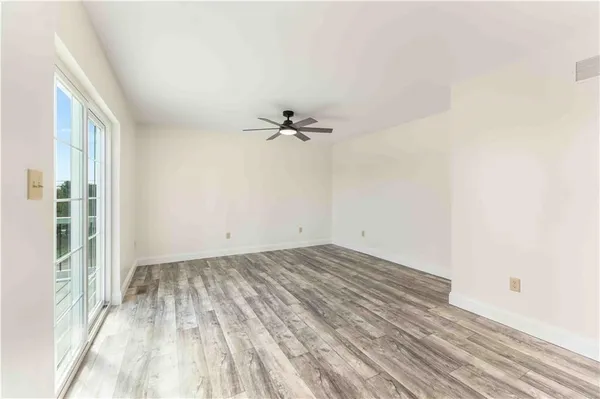 a view of a room with a window