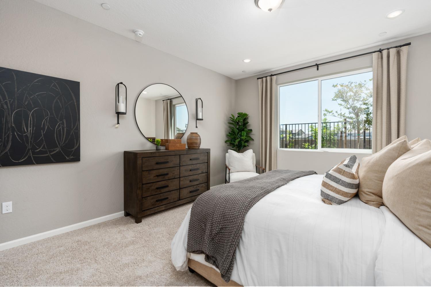 1601 Bloom Avenue Clovis, CA 93619 - Photo 24 of 28 a bedroom with a bed and a dresser