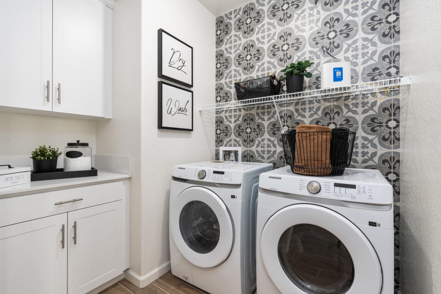 1601 Bloom Avenue Clovis, CA 93619 - Photo 28 of 28 a view of livingroom with washer and dryer