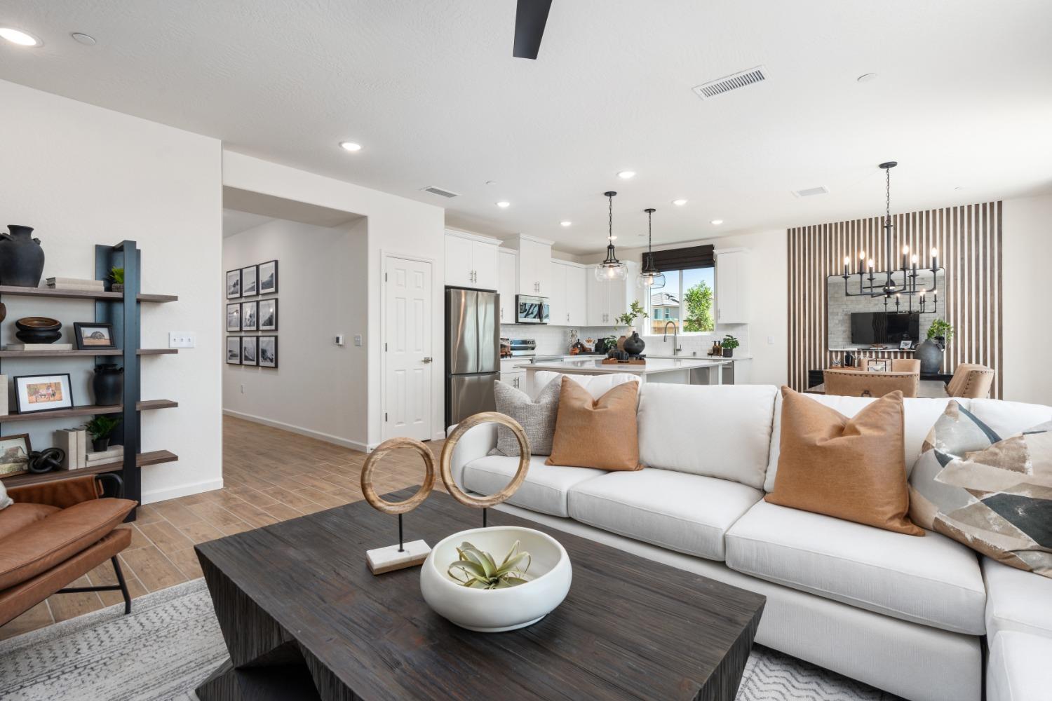 1601 Bloom Avenue Clovis, CA 93619 - Photo 6 of 28 a living room with furniture kitchen view and a table