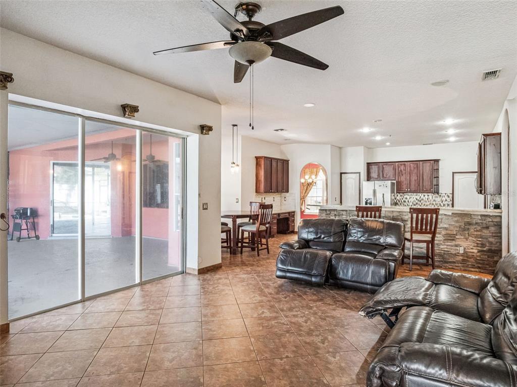 9101 Lake Coventry Court Gotha, FL 34734 - Photo 13 of 45 a living room with furniture