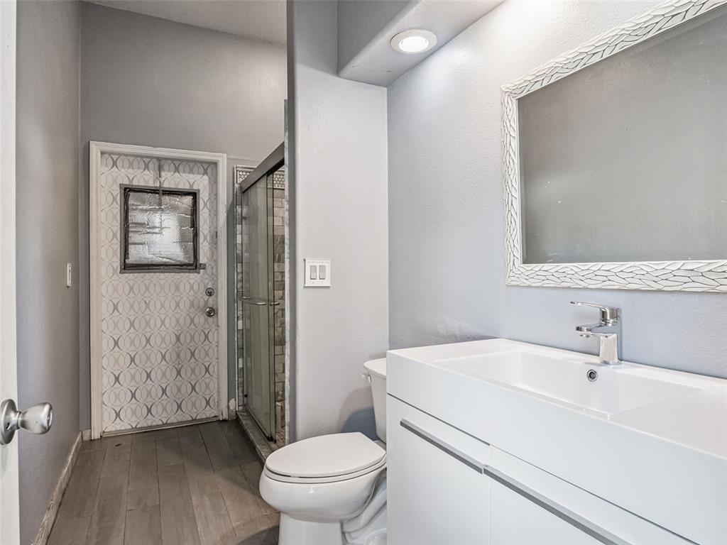 9101 Lake Coventry Court Gotha, FL 34734 - Photo 26 of 45 a bathroom with a sink toilet and shower