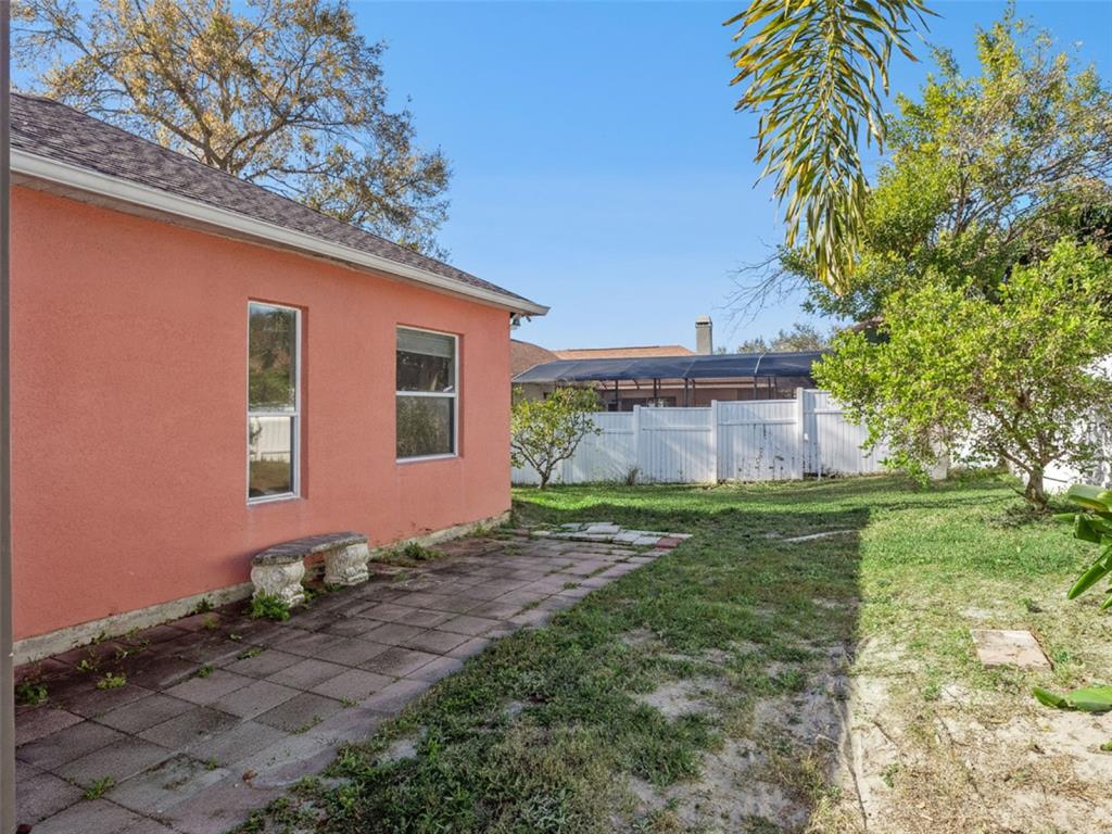 9101 Lake Coventry Court Gotha, FL 34734 - Photo 34 of 45 a view of a house with a yard