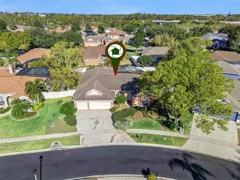 9101 Lake Coventry Court Gotha, FL 34734 - Photo 37 of 45 an aerial view of a house with a garden