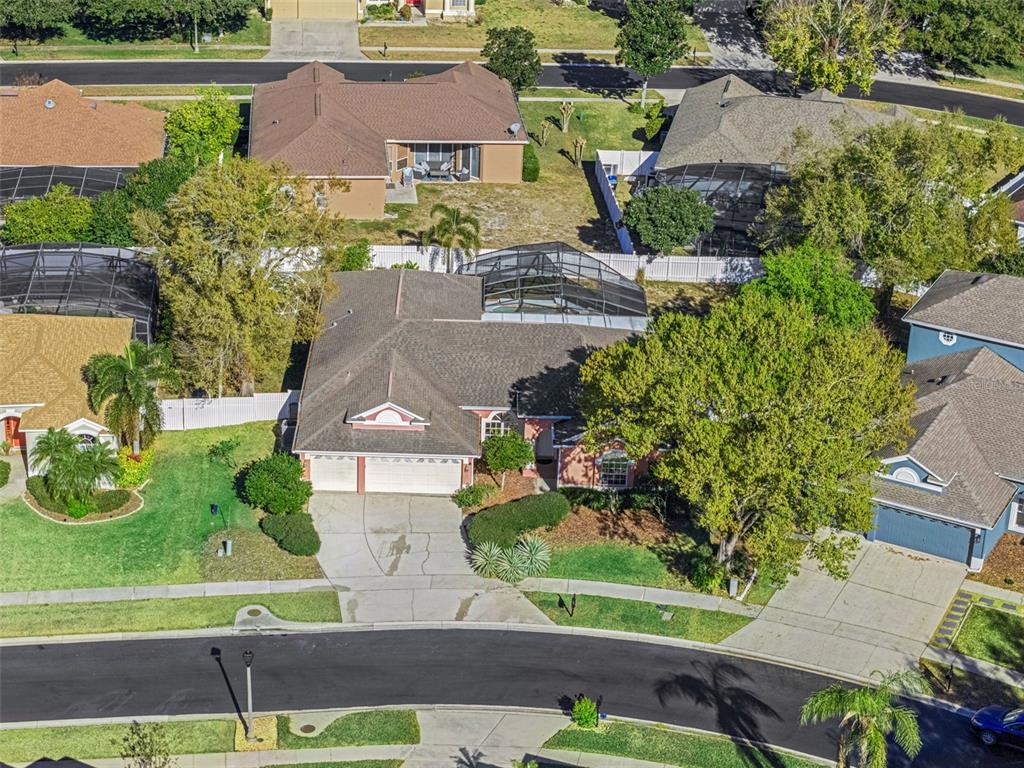 9101 Lake Coventry Court Gotha, FL 34734 - Photo 38 of 45 an aerial view of a house with a garden and lake view