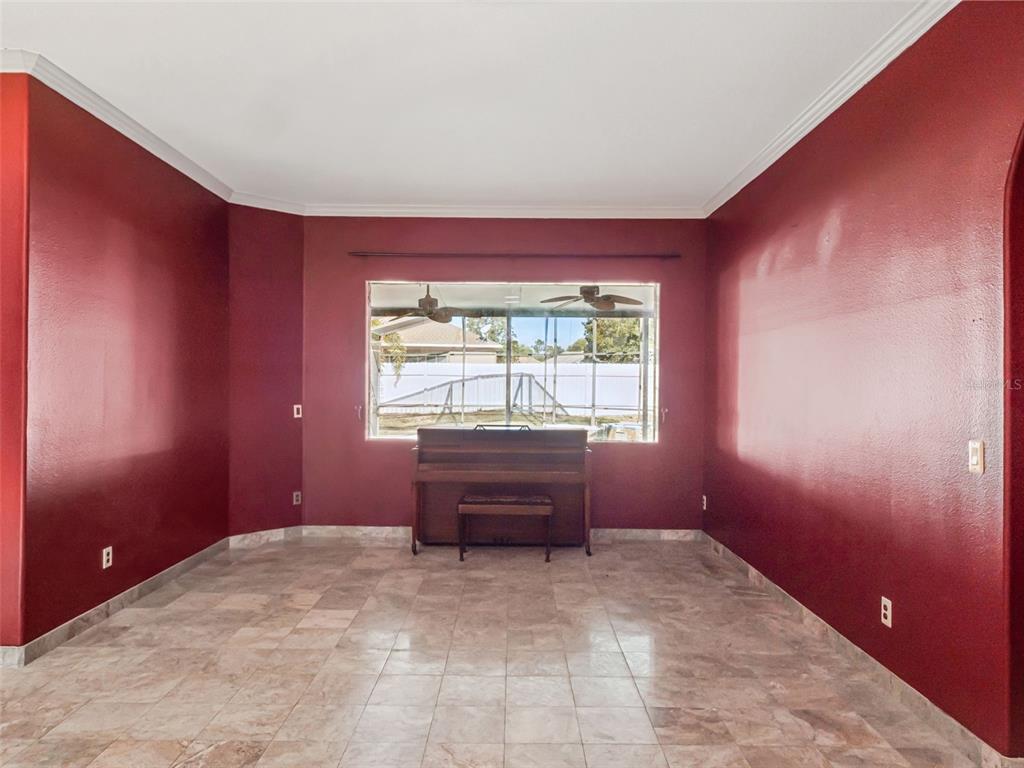 9101 Lake Coventry Court Gotha, FL 34734 - Photo 4 of 45 a view of an empty room with a window