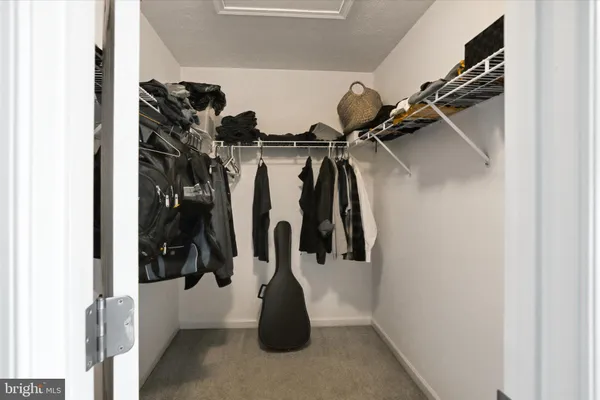 a close up view of a walk in closet