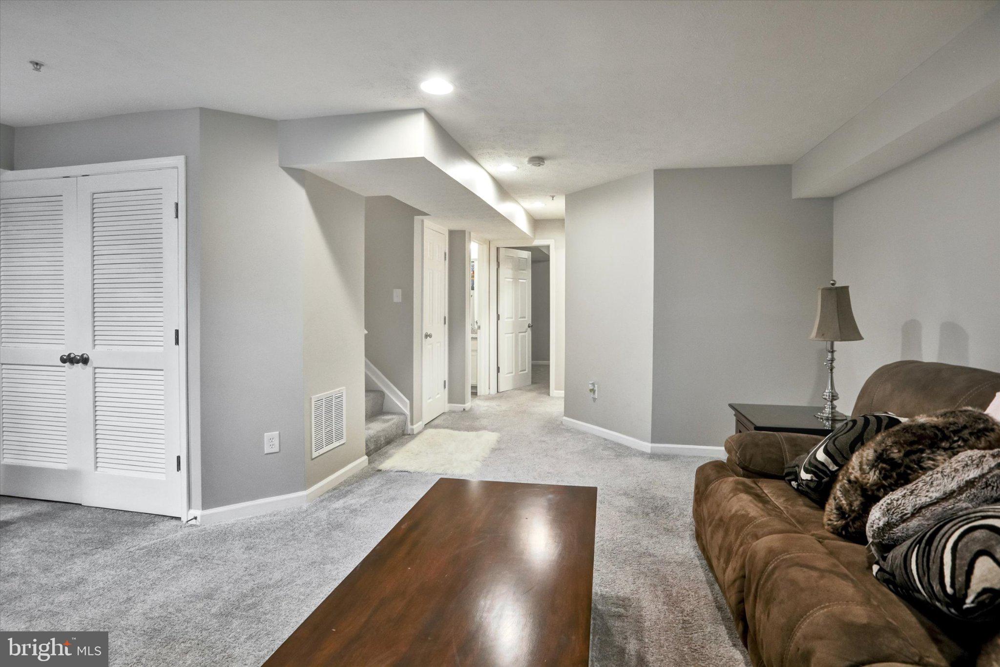 9663 Davison Road Middle River, MD 21220 - Photo 32 of 45 Cozy basement retreat with modern charm.